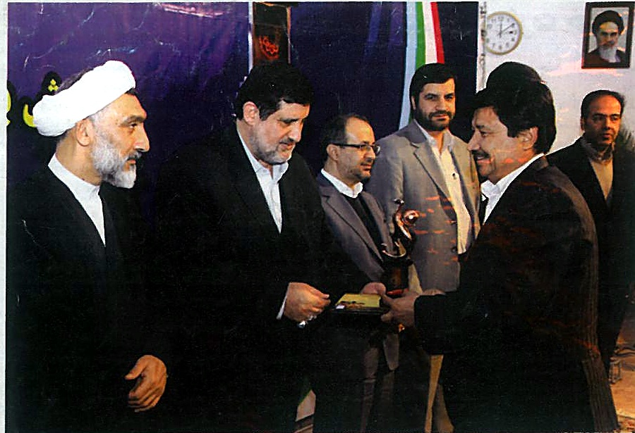 Nabi Rezaei receiving the Best Exporter award for Karimabad Jiroft Co., South Kerman Province, 2012