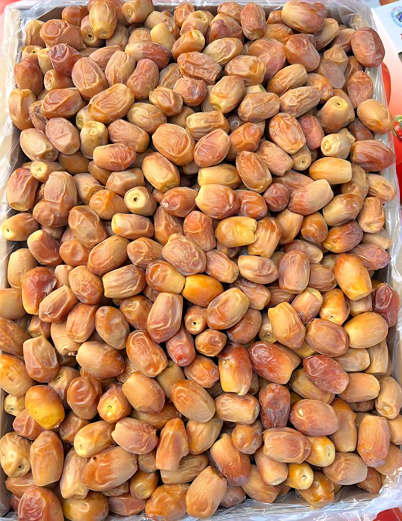 A full crate of golden Zahedi dates